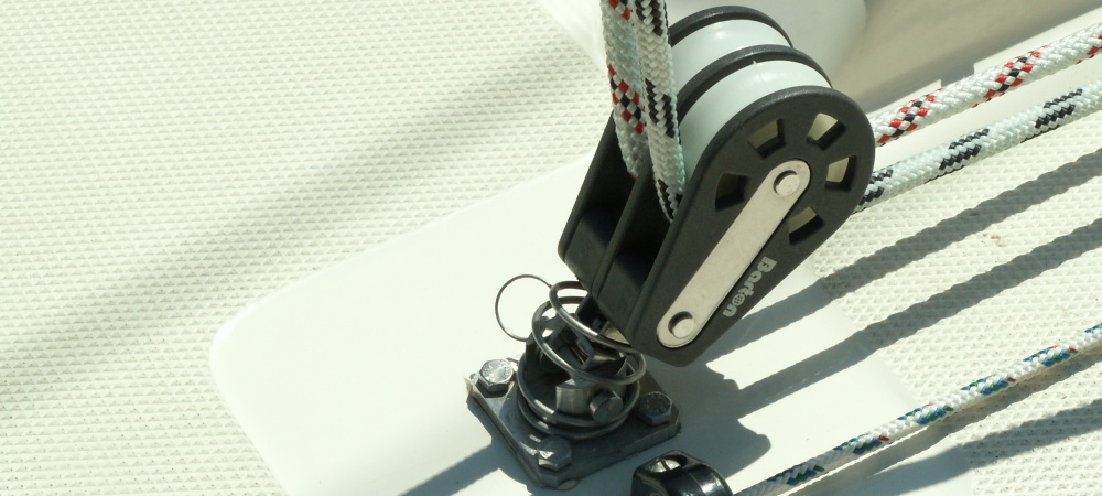 Halliard Barton block upgrade. This is a common upgrade- the fitting on deck fails. I created a custom 316 St Stl fitting.